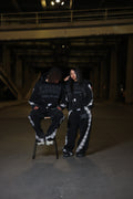 BLE222ED 2Tarry Night sweatpants, black stone-washed polar fleece with a screenprinted Flower of Life